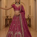 Royal Rani Pink Silk Embroidered Lehenga Choli with Peacock Motif Border and Designer Dupatta