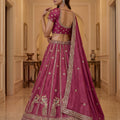 Royal Rani Pink Silk Embroidered Lehenga Choli with Peacock Motif Border and Designer Dupatta