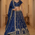 Luxurious Navy Blue Silk Embroidered Lehenga Choli with Peacock Motif Border and Designer Dupatta