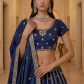 Luxurious Navy Blue Silk Embroidered Lehenga Choli with Peacock Motif Border and Designer Dupatta