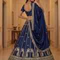 Luxurious Navy Blue Silk Embroidered Lehenga Choli with Peacock Motif Border and Designer Dupatta