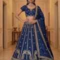 Luxurious Navy Blue Silk Embroidered Lehenga Choli with Peacock Motif Border and Designer Dupatta