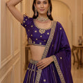 Majestic Dark Purple Silk Embroidered Lehenga Choli with Peacock Motif Border and Designer Dupatta