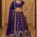 Majestic Dark Purple Silk Embroidered Lehenga Choli with Peacock Motif Border and Designer Dupatta