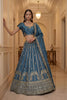 Exquisite Sky Blue Silk Embroidered Lehenga Choli with Peacock Motif Border and Designer Dupatta
