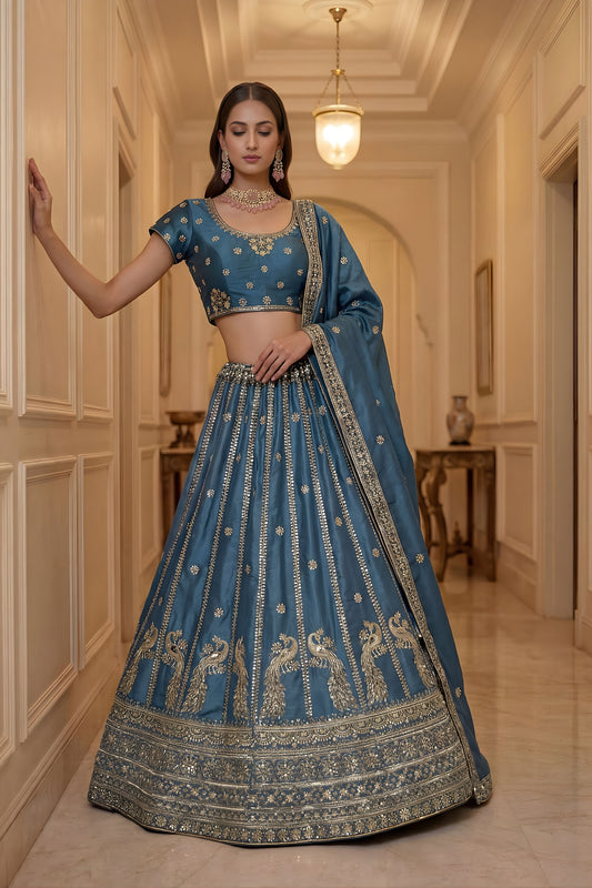 Exquisite Sky Blue Silk Embroidered Lehenga Choli with Peacock Motif Border and Designer Dupatta
