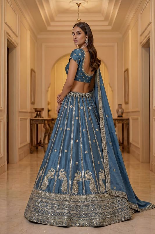 Exquisite Sky Blue Silk Embroidered Lehenga Choli with Peacock Motif Border and Designer Dupatta