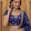 Amazing Blue Silk Embroidered Lehenga Choli with Peacock Motif Border and Designer Dupatta