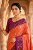 Wonderful Peach Patola Silk Saree Floral Woven Border Wedding Wear