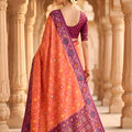 Wonderful Peach Patola Silk Saree Floral Woven Border Wedding Wear