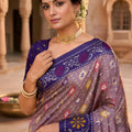 Graceful Lavender Patola Silk Saree Woven Border for Wedding Wear