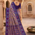 Graceful Lavender Patola Silk Saree Woven Border for Wedding Wear