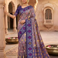 Graceful Lavender Patola Silk Saree Woven Border for Wedding Wear
