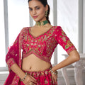 Elegant Rani Pink Silk Embroidered Designer Lehenga Choli with Soft Net Dupatta for Wedding