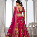 Elegant Rani Pink Silk Embroidered Designer Lehenga Choli with Soft Net Dupatta for Wedding