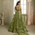 Elegant Olive Green Butterfly Net Designer Lehenga Choli with Heavy Embroidery Work for Wedding