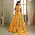 Stylish Mustard Yellow Butterfly Net Designer Lehenga Choli with Heavy Embroidery Work for Wedding