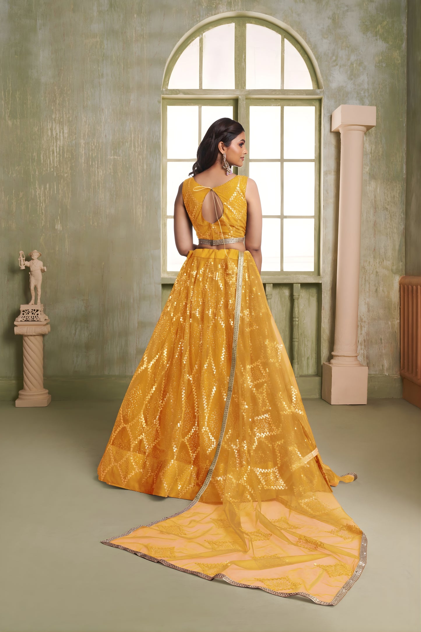 Stylish Mustard Yellow Butterfly Net Designer Lehenga Choli with Heavy Embroidery Work for Wedding