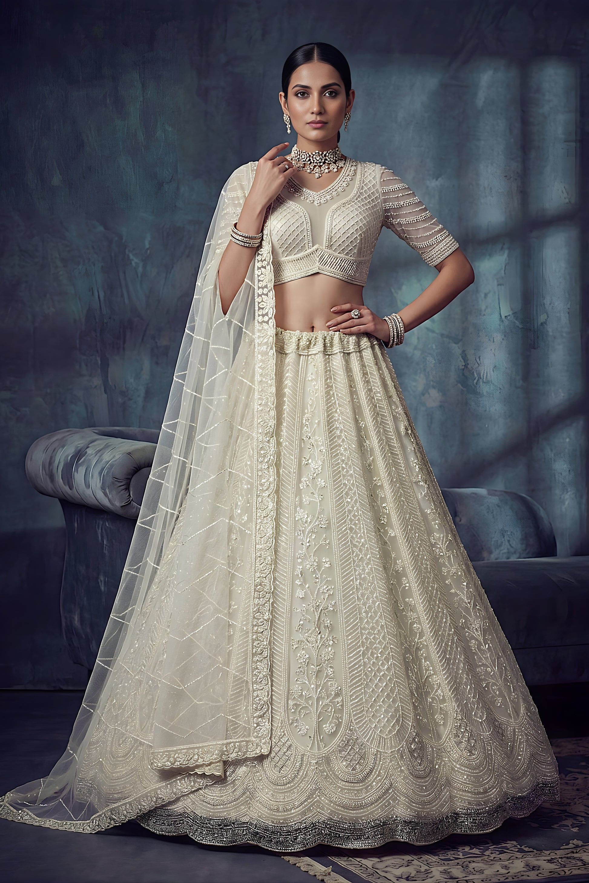 Elegant Off White Net Lehenga Choli with Heavy Embroidery Work for Wedding
