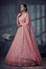 Impressive Dusty Rose Pink Net Lehenga Choli with Heavy Embroidery Work for Wedding