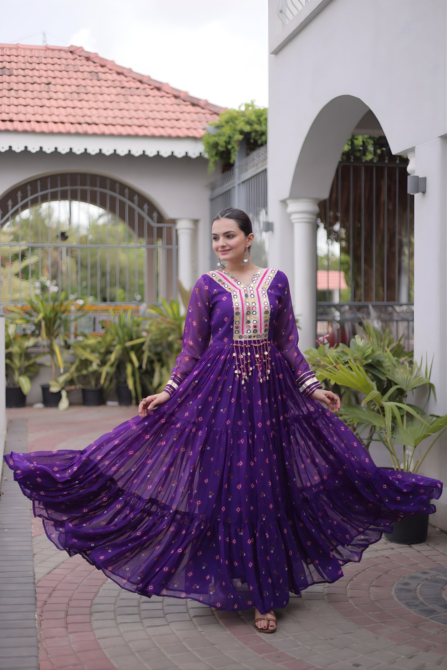 Outstanding Purple Faux Georgette Designer Gown with Mirror Work for Women
