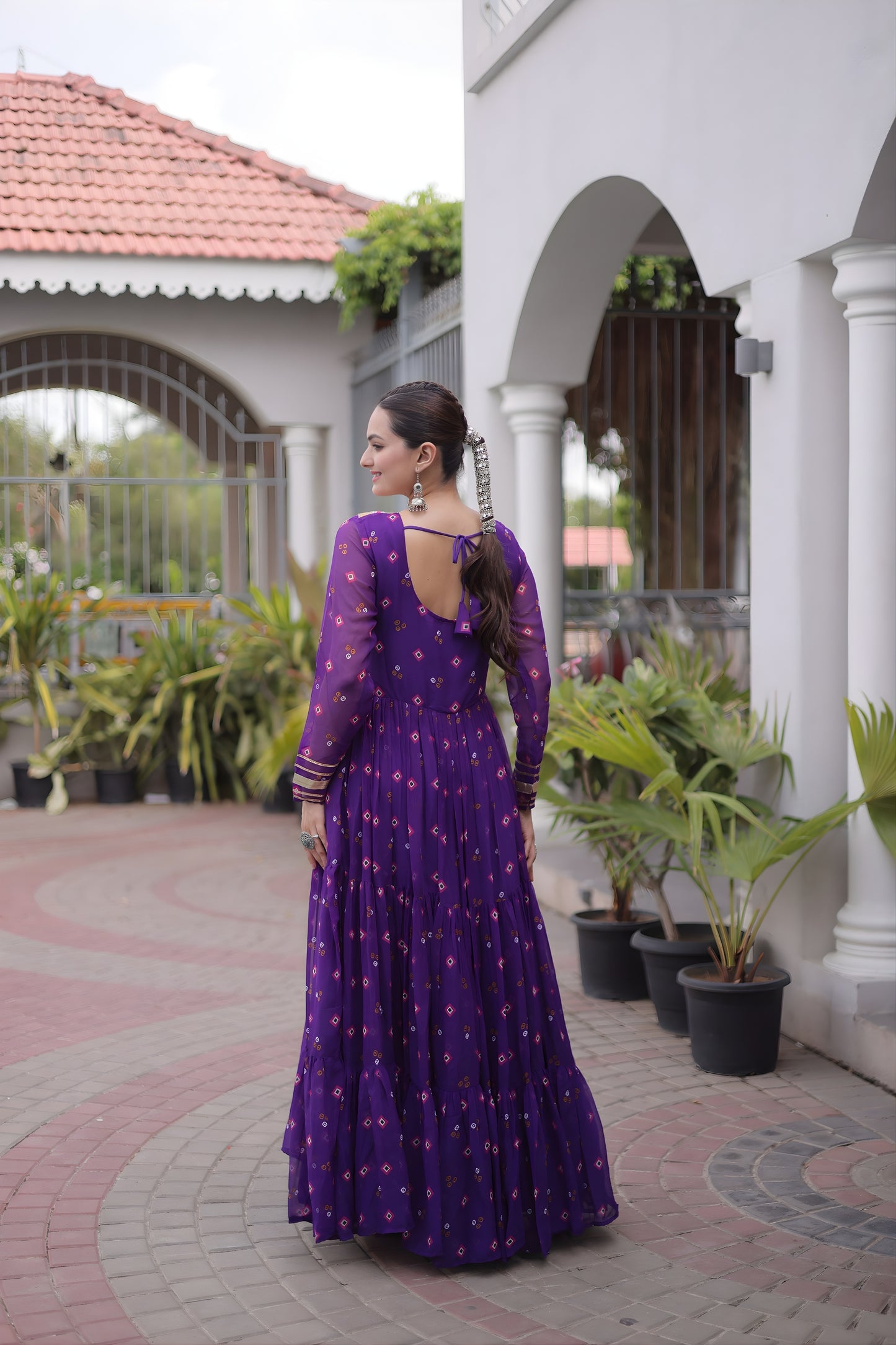 Outstanding Purple Faux Georgette Designer Gown with Mirror Work for Women