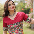 Vibrant Mustard Yellow and Maroon Roman Silk Navratri Lehenga Choli with Kutchi Gamthi Embroidery Work