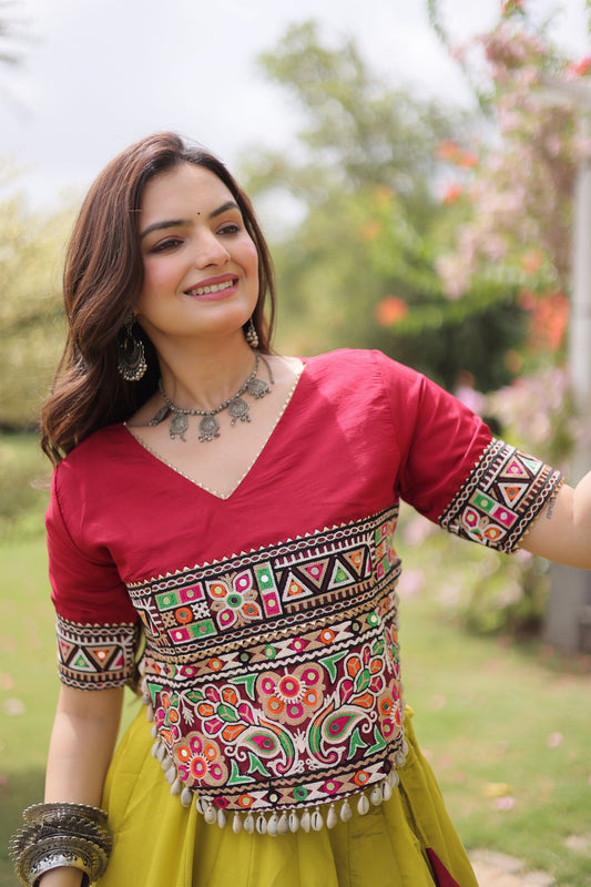 Vibrant Mustard Yellow and Maroon Roman Silk Navratri Lehenga Choli with Kutchi Gamthi Embroidery Work