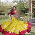 Vibrant Mustard Yellow and Maroon Roman Silk Navratri Lehenga Choli with Kutchi Gamthi Embroidery Work