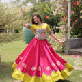 Stunning Rani Pink and Yellow Roman Silk Navratri Lehenga Choli with Kutchi Gamthi Embroidery Work