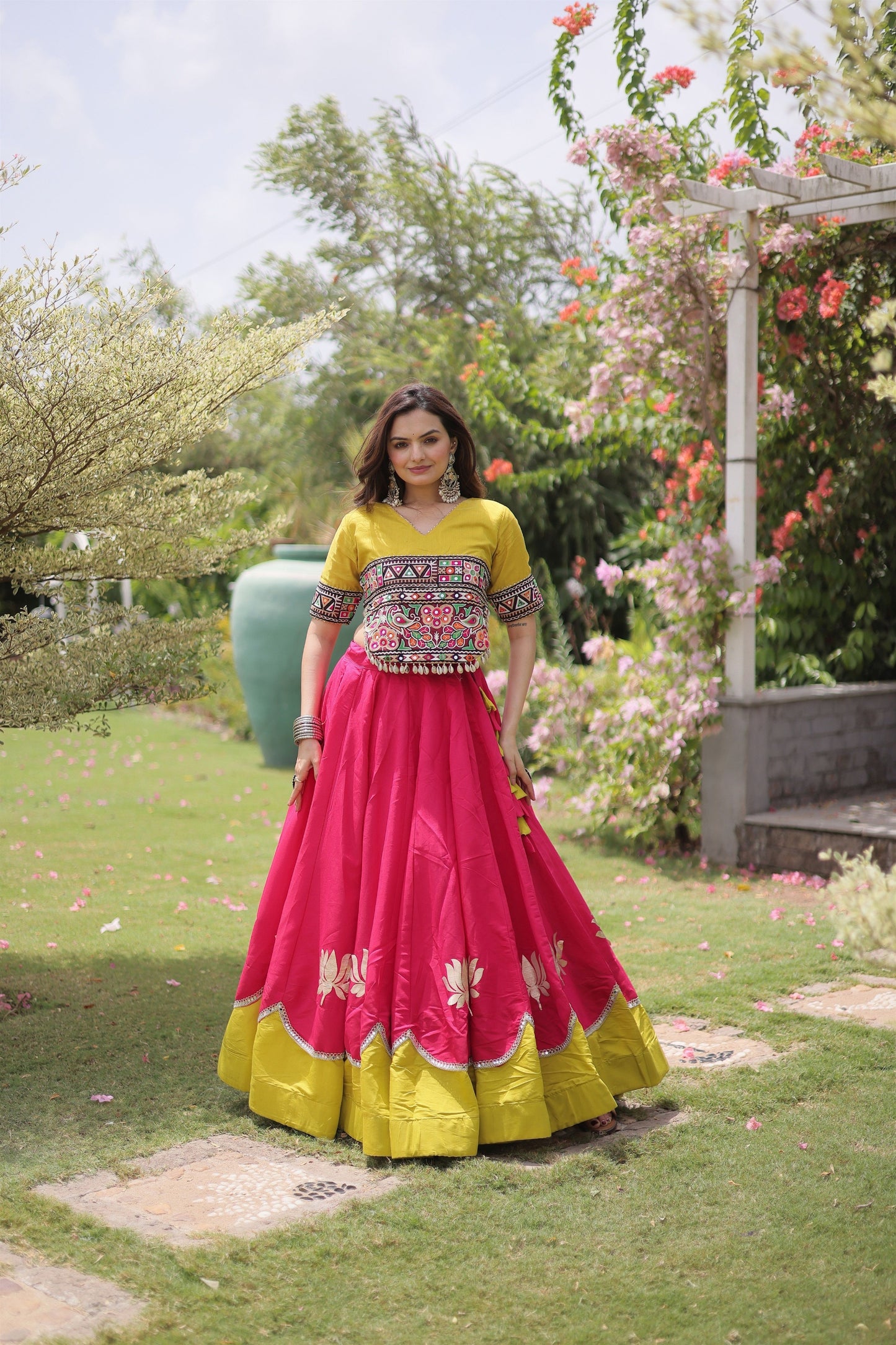 Stunning Rani Pink and Yellow Roman Silk Navratri Lehenga Choli with Kutchi Gamthi Embroidery Work