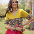 Stunning Rani Pink and Yellow Roman Silk Navratri Lehenga Choli with Kutchi Gamthi Embroidery Work