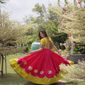 Stunning Rani Pink and Yellow Roman Silk Navratri Lehenga Choli with Kutchi Gamthi Embroidery Work
