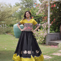 Traditional Black and Yellow Roman Silk Navratri Lehenga Choli with Kutchi Gamthi Embroidery Work