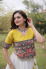 Impressive White and Yellow Roman Silk Navratri Lehenga Choli with Kutchi Gamthi Embroidery Work