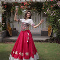 Awesome White and Rani Pink Roman Silk Navratri Lehenga Choli with Kutchi Gamthi Embroidery Work