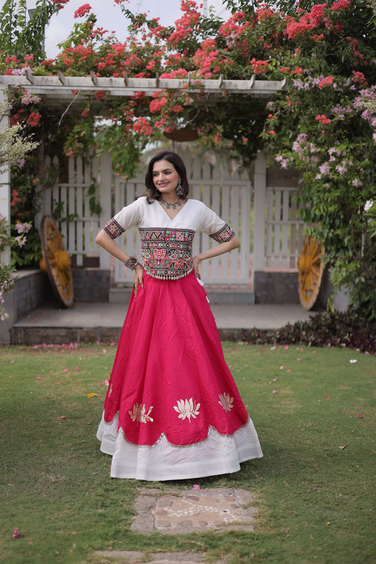 Awesome White and Rani Pink Roman Silk Navratri Lehenga Choli with Kutchi Gamthi Embroidery Work