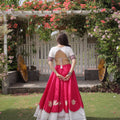 Awesome White and Rani Pink Roman Silk Navratri Lehenga Choli with Kutchi Gamthi Embroidery Work