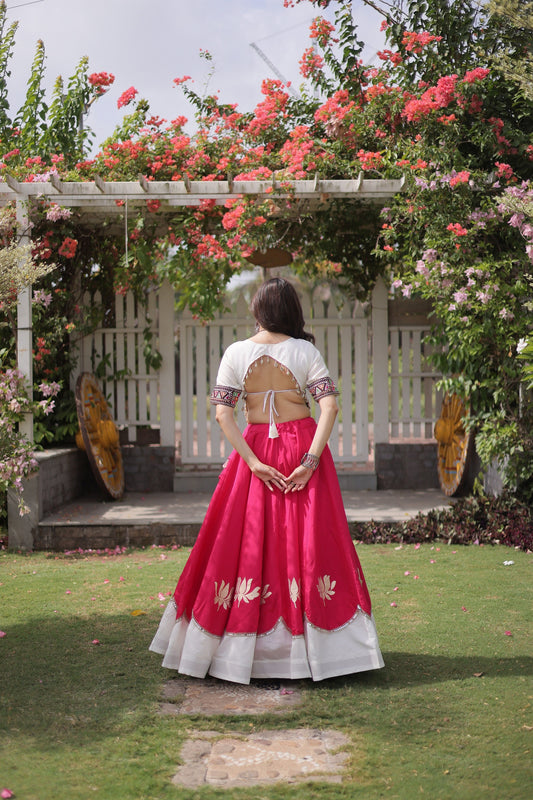 Awesome White and Rani Pink Roman Silk Navratri Lehenga Choli with Kutchi Gamthi Embroidery Work