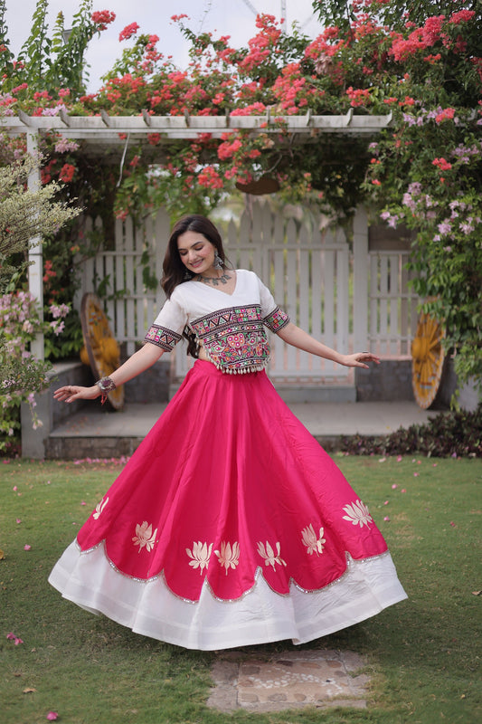 Awesome White and Rani Pink Roman Silk Navratri Lehenga Choli with Kutchi Gamthi Embroidery Work