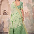 Graceful Pista Green Linen Woven Resham Designer Saree for Women