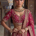 Luxury Rani Pink Designer Bridal Lehenga Choli with Embroidery Work and Net Dupatta