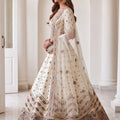 Charming Off White Designer Bridal Lehenga Choli with Heavy Embroidery Work and Net Dupatta