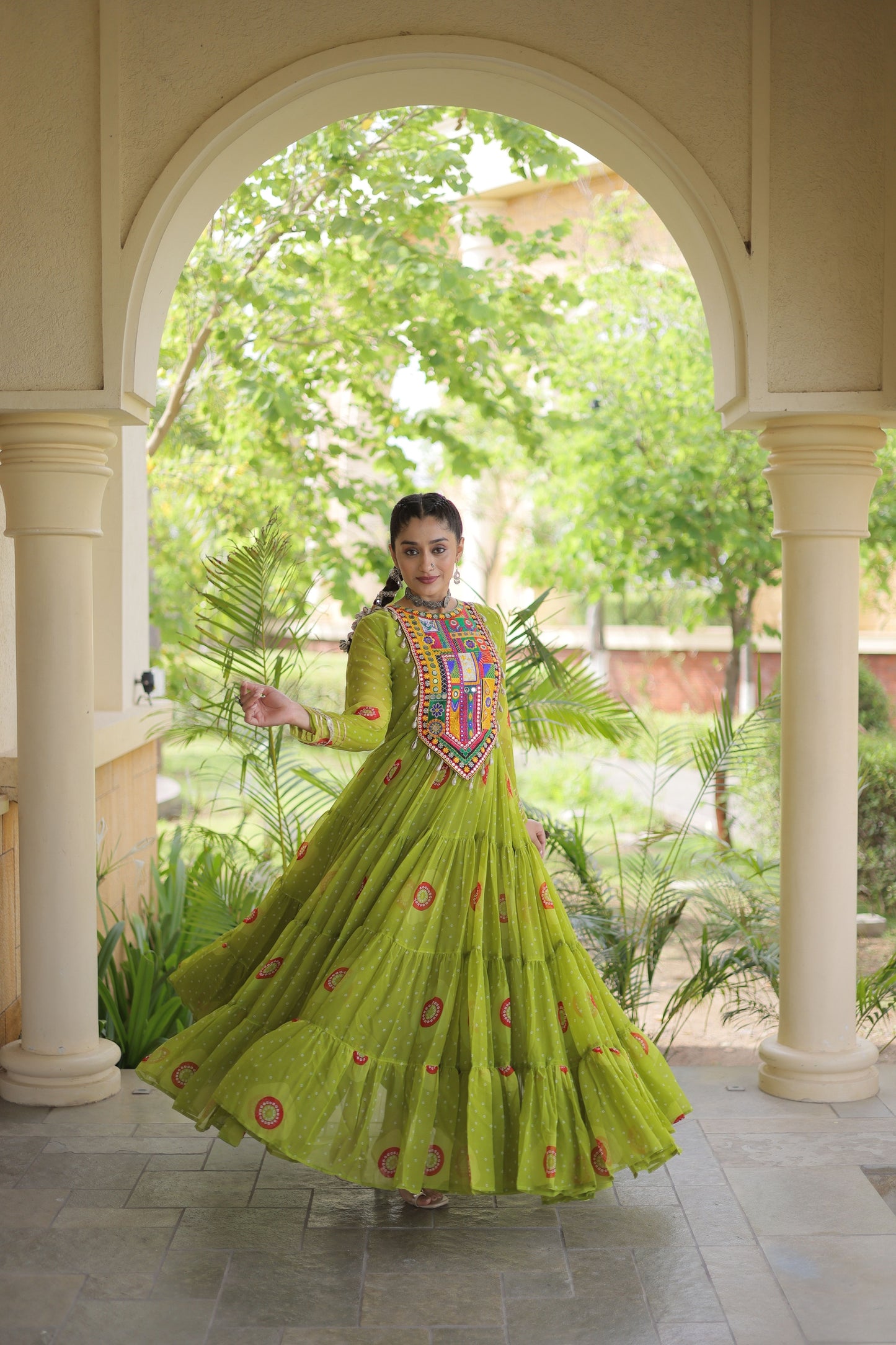 Gorgeous Green Faux Georgette Designer Gown with Bandhani Printed Flared Skirt