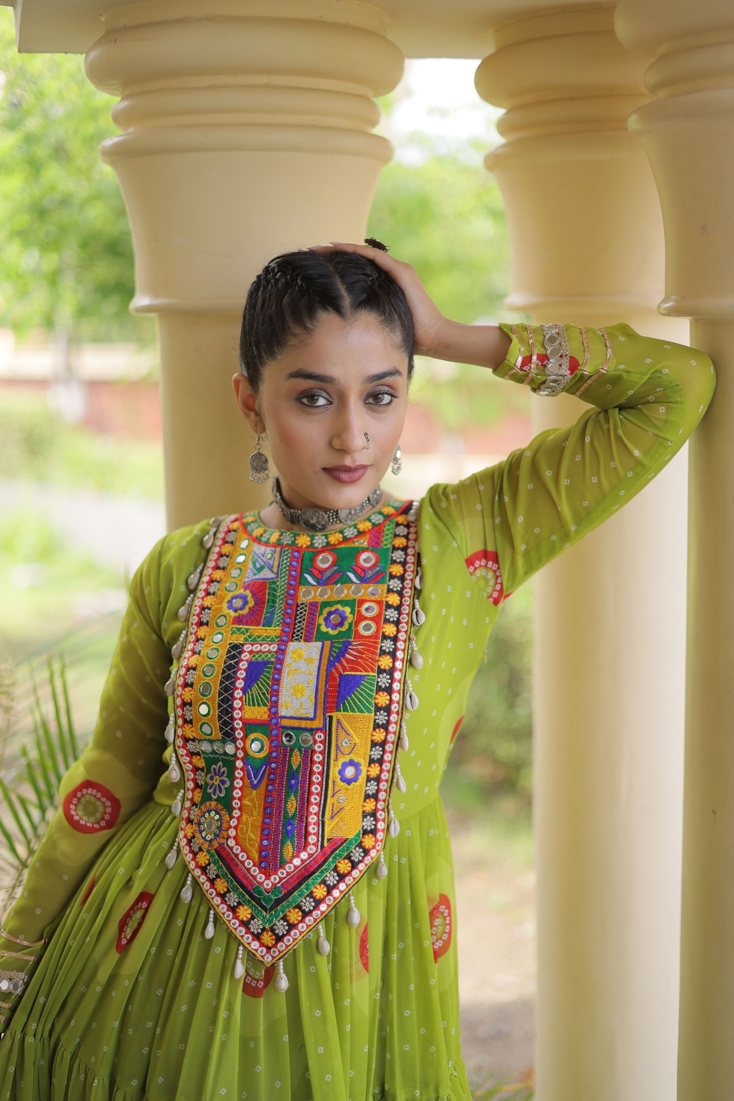 Gorgeous Green Faux Georgette Designer Gown with Bandhani Printed Flared Skirt