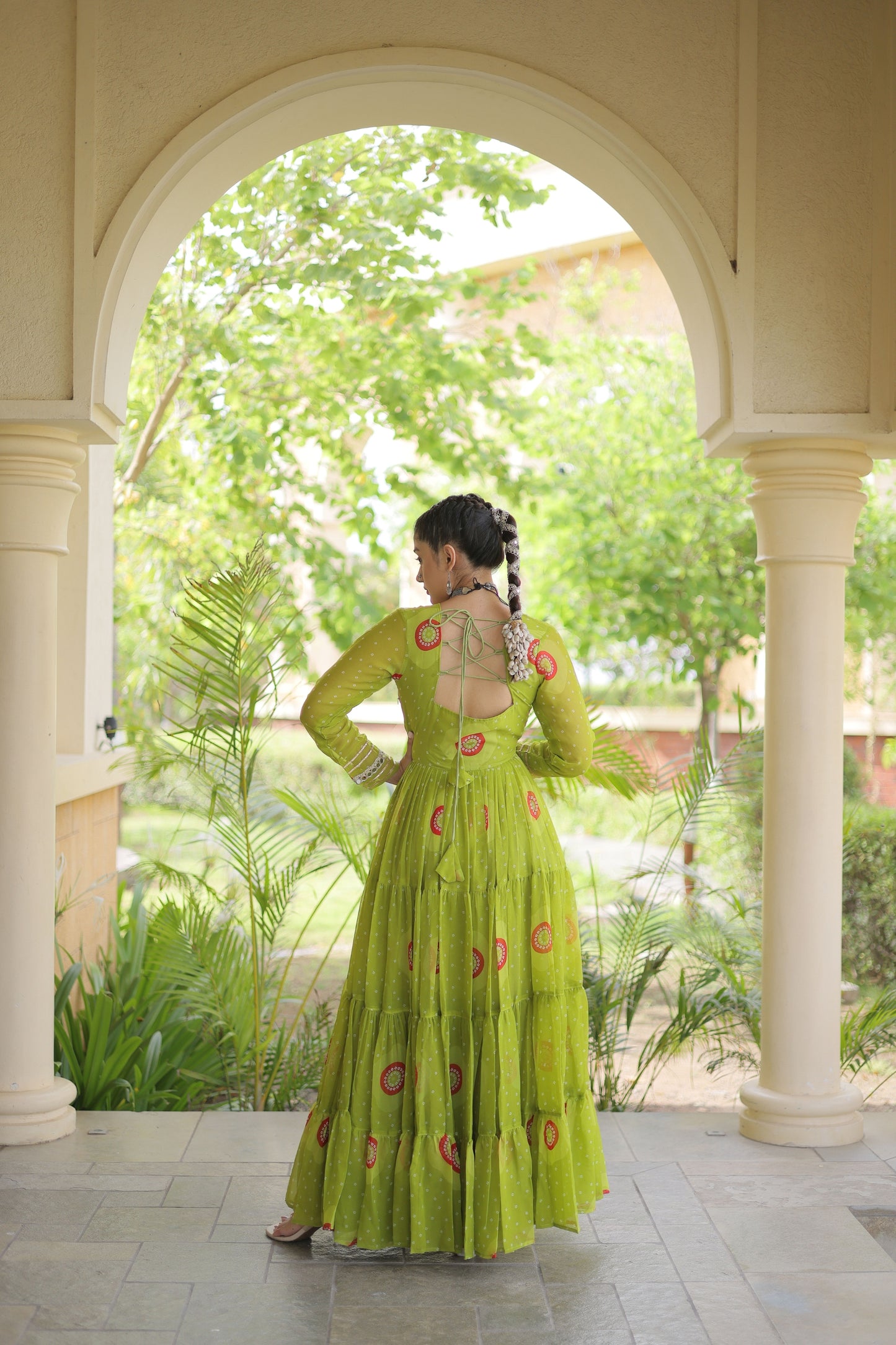 Gorgeous Green Faux Georgette Designer Gown with Bandhani Printed Flared Skirt