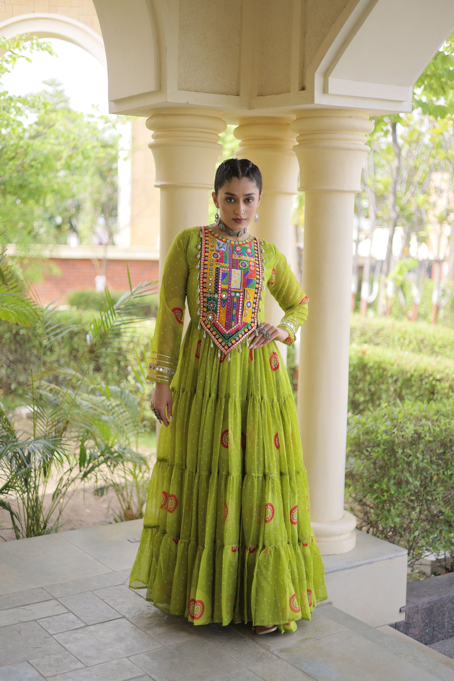Gorgeous Green Faux Georgette Designer Gown with Bandhani Printed Flared Skirt