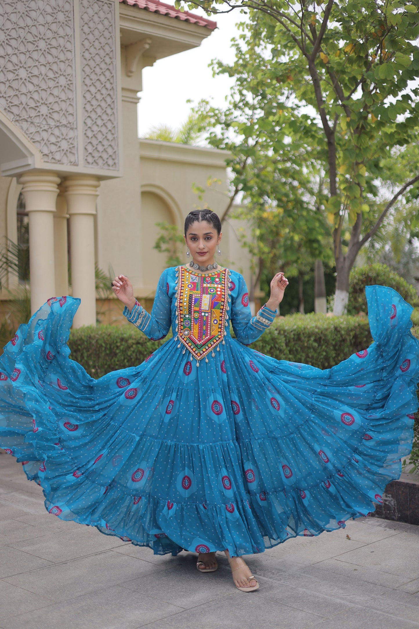 Delicate Sky Blue Faux Georgette Designer Gown with Bandhani Printed Flared Skirt