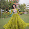 Awesome Parrot Green Faux Georgette Bandhani Printed Designer Gown for Navratri