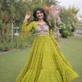 Awesome Parrot Green Faux Georgette Bandhani Printed Designer Gown for Navratri
